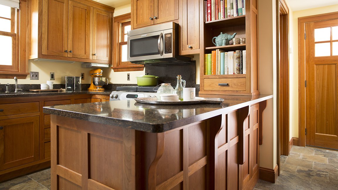 Modern Craftsman Kitchen with cherry cabinets and granite countertops