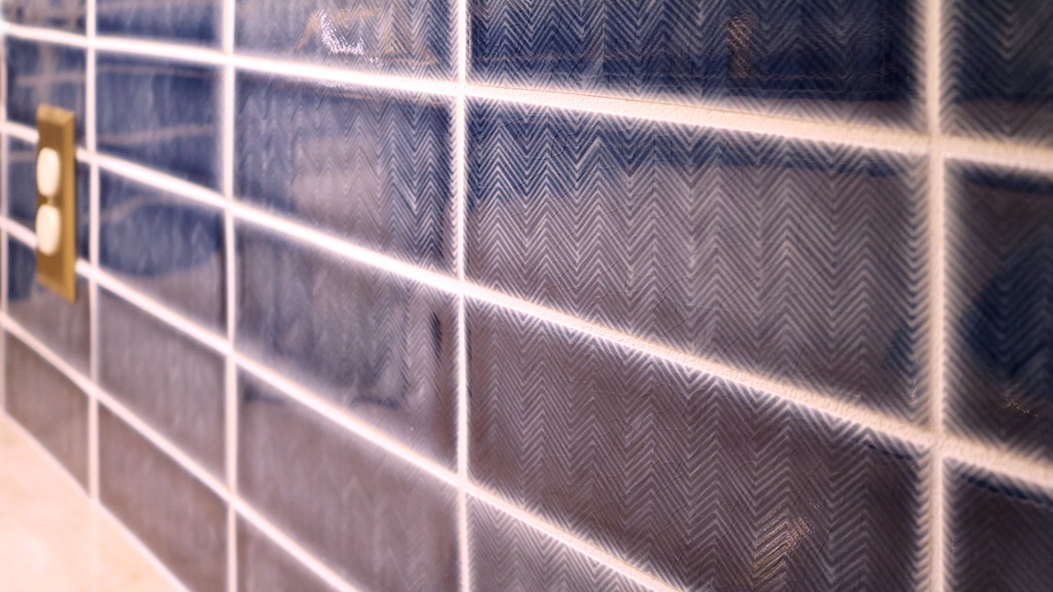 Handmade blue chevron patterned backsplash tile