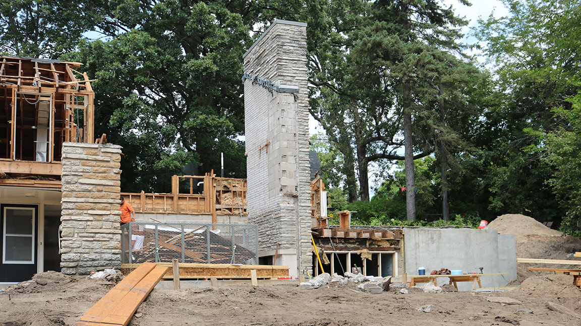 Residential Demolition with Free-Standing Stone Chimney