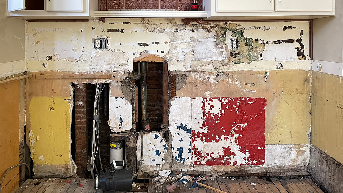 An old wall during residential kitchen demolition