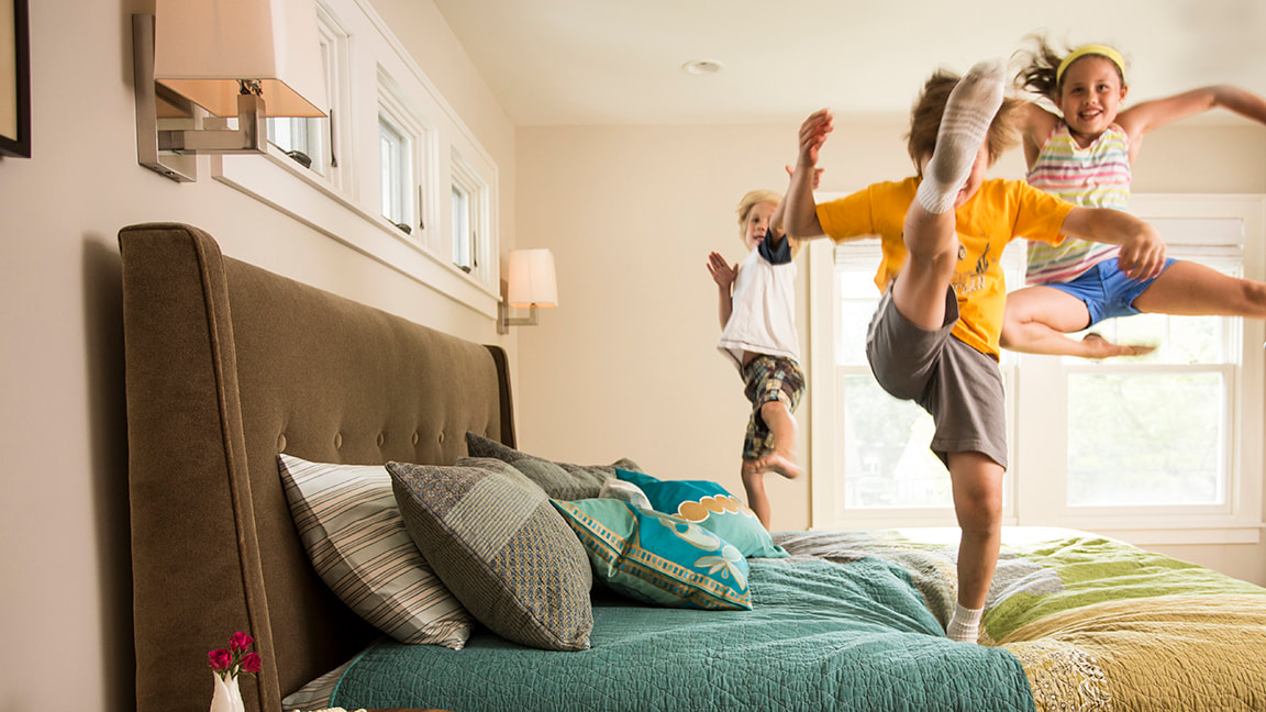 Kids Jumping on Bed