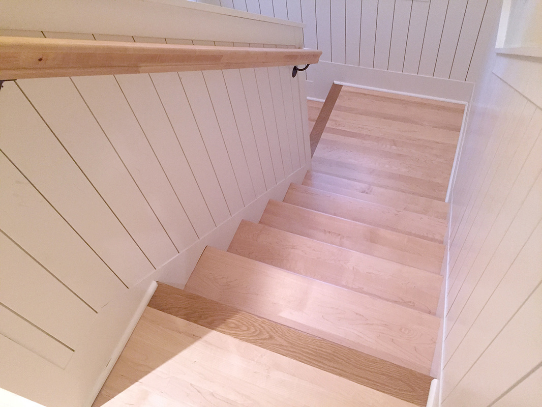 Maple stair treads with red oak nosing